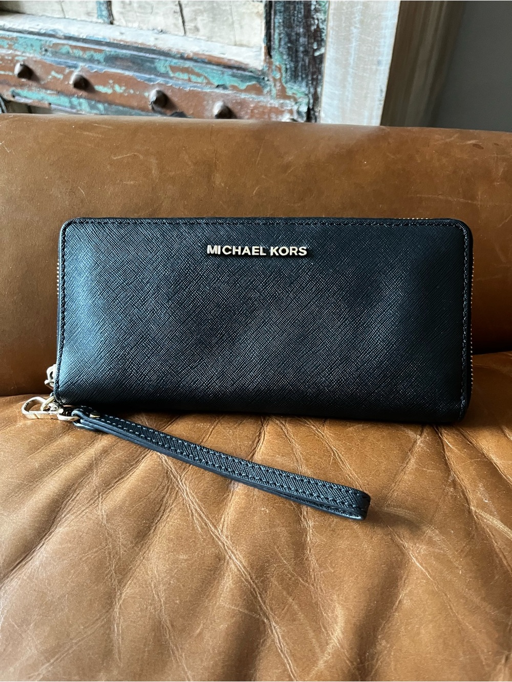 Michael Kors Black Saffiano Zip-Around Wristlet with Gold Logo